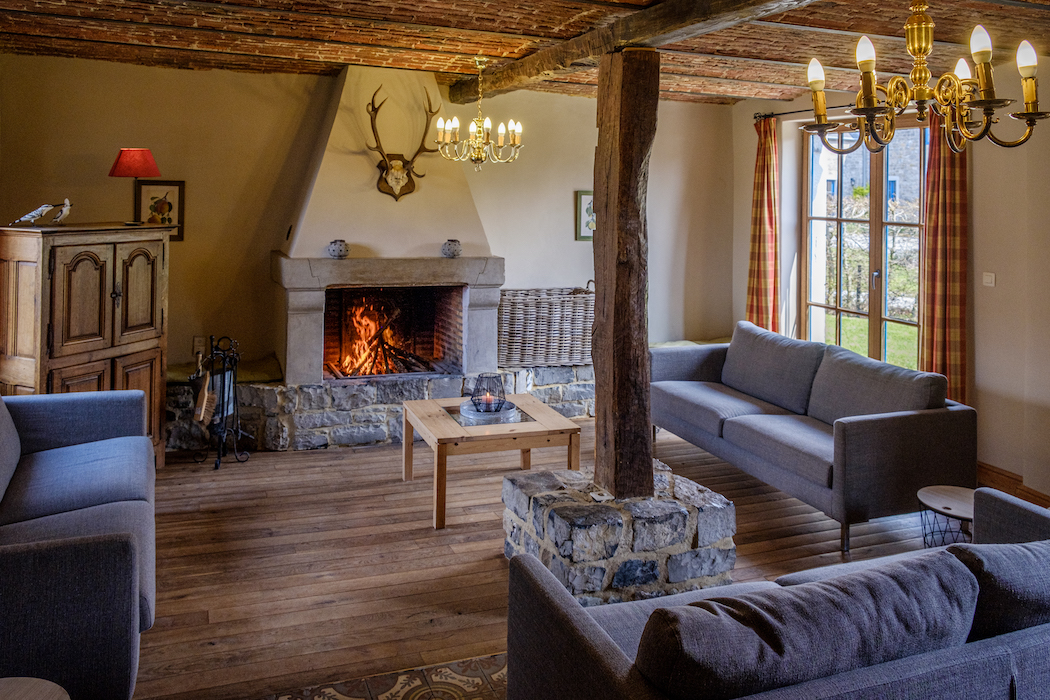 Sit back and relax in the comfortable sofas around the fire crackling in the fireplace.