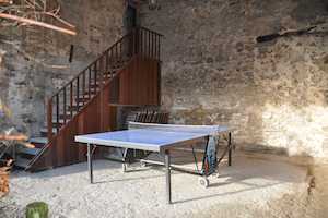 A ping -pong located under the covered terrace for the enjoyment of young and old alike !